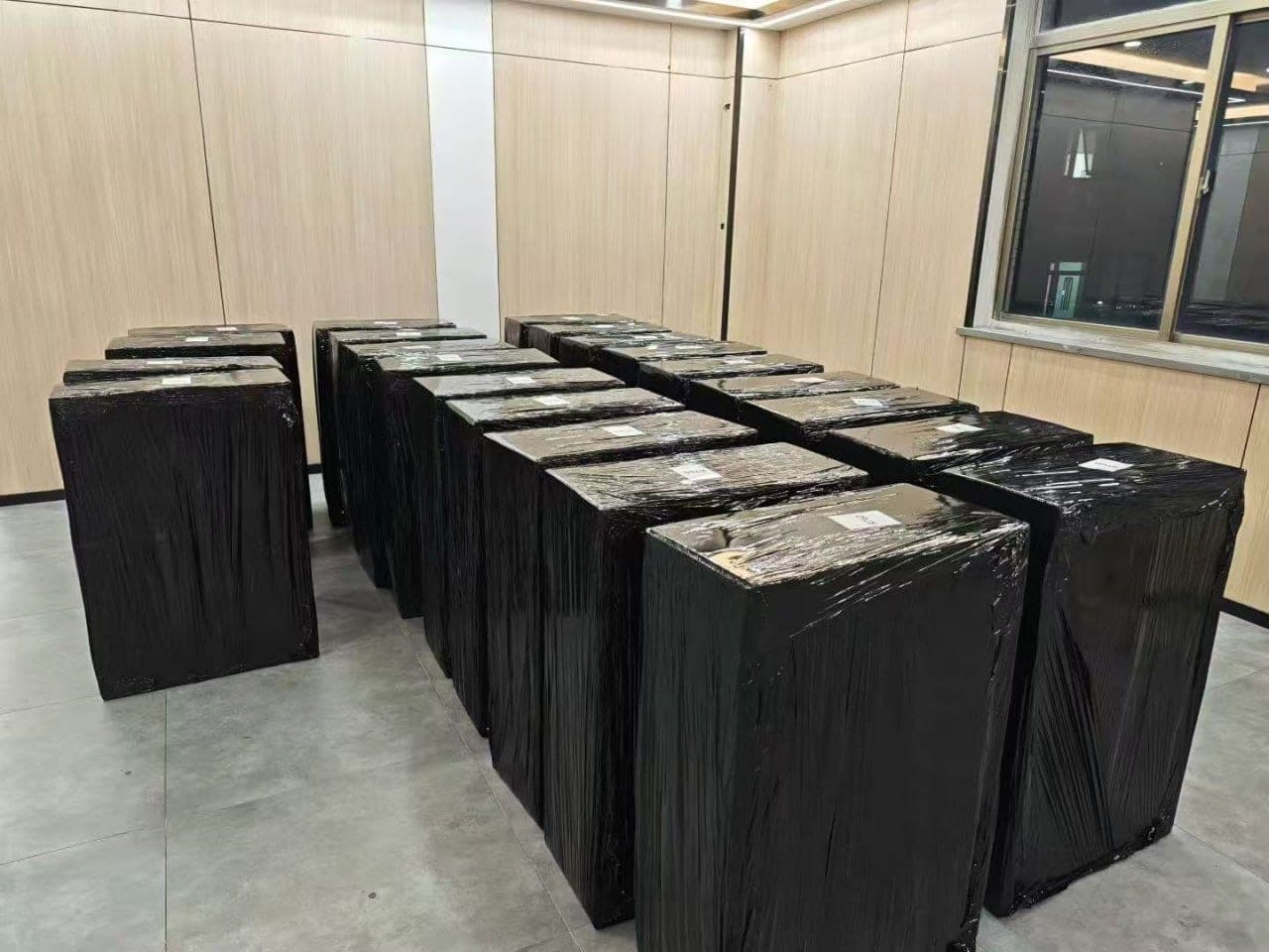Shrink-wrapped server pallets ready for export in the Fanxi warehouse, Dalian